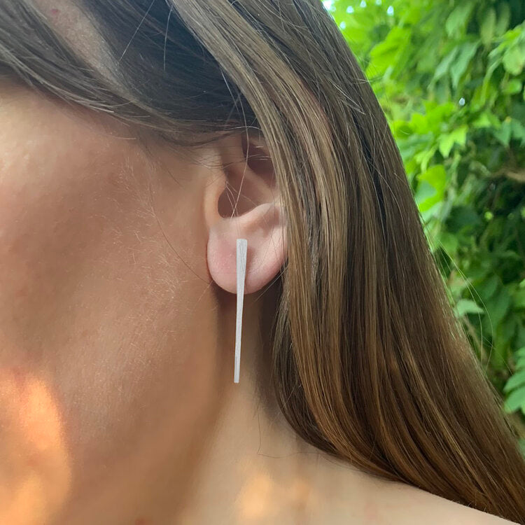 Kate Phipps Jewellery silver tapered stud earrings model photo