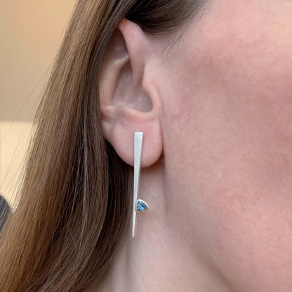 Kate Phipps Jewellery silver and Swiss blue topaz tapered stud earrings model photo