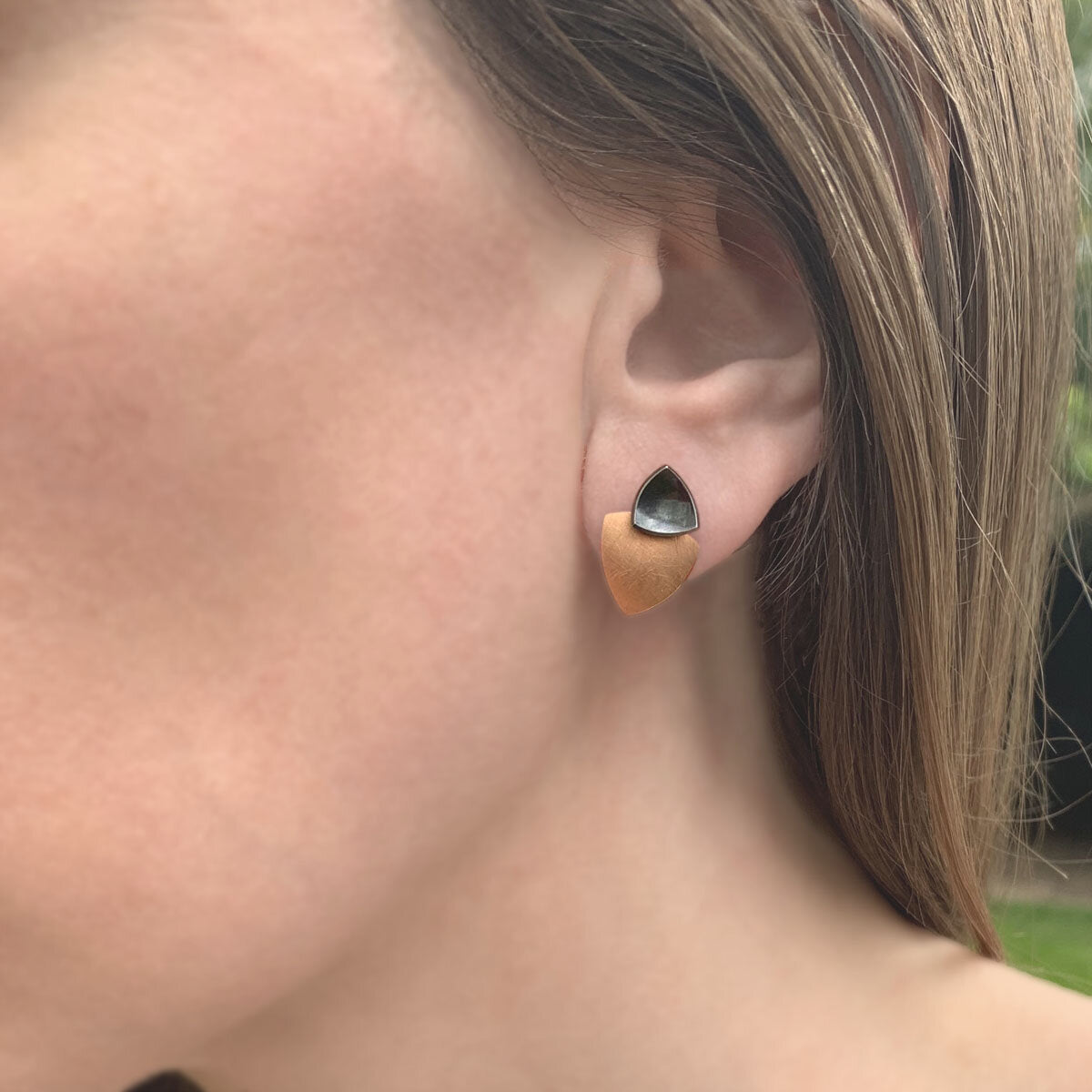 Kate Phipps Jewellery Trillion duo multiway stud earrings oxidised silver stud and 18 carat rose gold plated silver lower section model photo 1