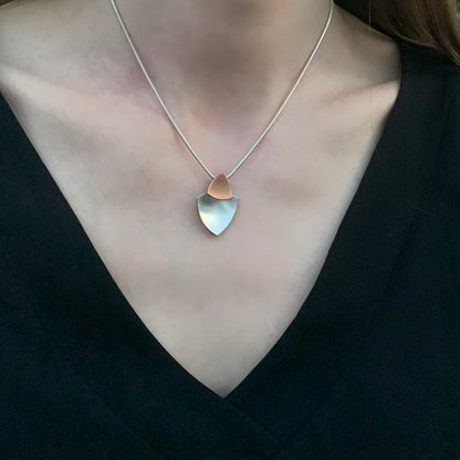 Kate Phipps Jewellery Trillion duo necklace 18 carat rose gold plated silver top section and silver lower section concave side model photo 1