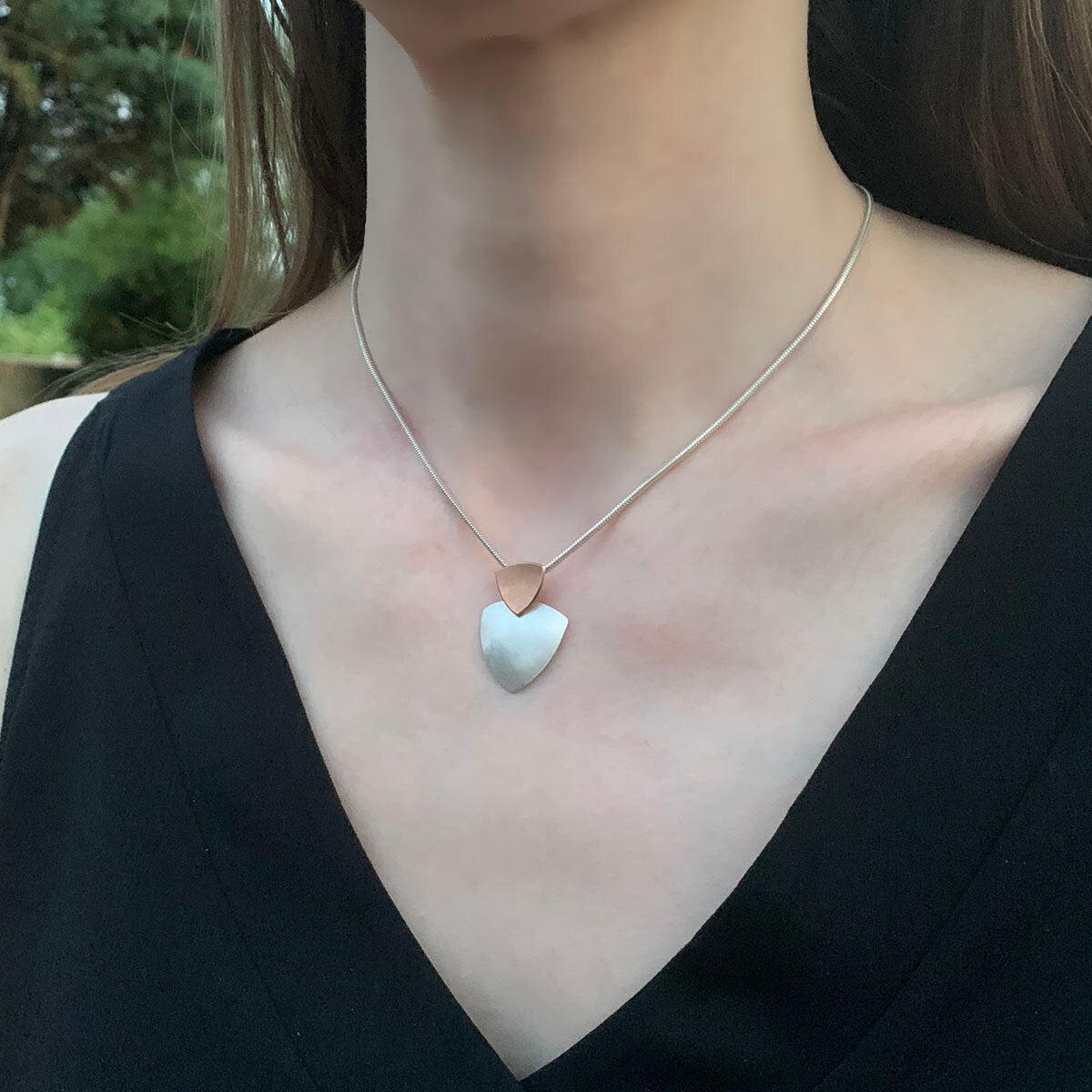 Kate Phipps Jewellery Trillion duo necklace 18 carat rose gold plated silver top section and silver lower section convex side model photo 2