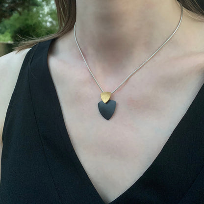 Kate Phipps Jewellery Trillion duo necklace 22 carat yellow gold plated silver top section and oxidised silver lower section convex side model photo 2