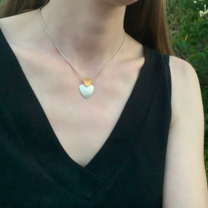 Kate Phipps Jewellery Trillion duo necklace 22 carat yellow gold plated silver top section and silver lower section convex side model photo 1