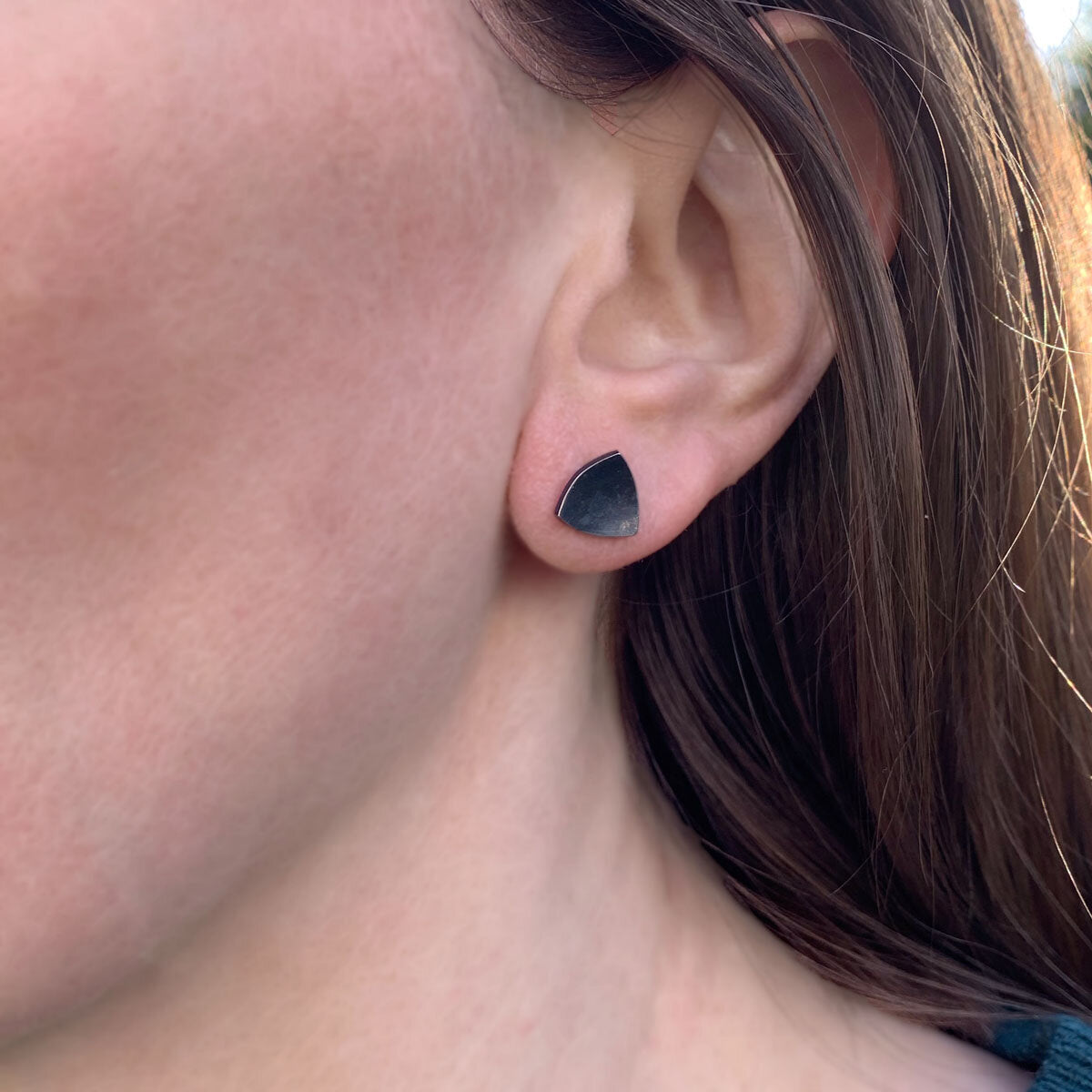 Kate Phipps Jewellery Trillion stud earrings medium oxidised silver model photo